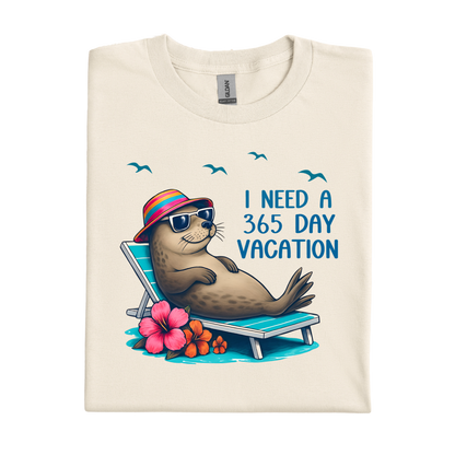 Natural t-shirt with a seal graphic and text 'I Need a 365 Day Vacation' on a white background