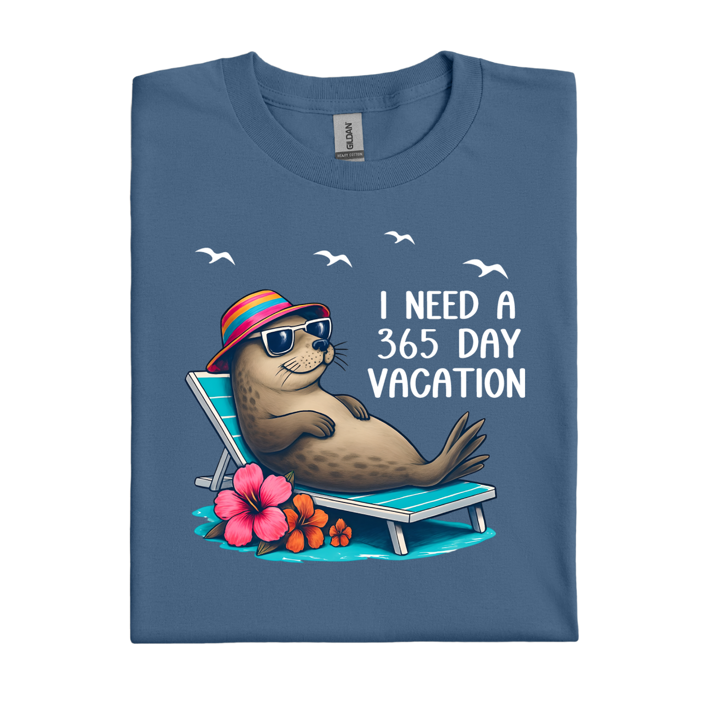 Indigo Blue t-shirt with a seal graphic and text 'I Need a 365 Day Vacation' on a white background