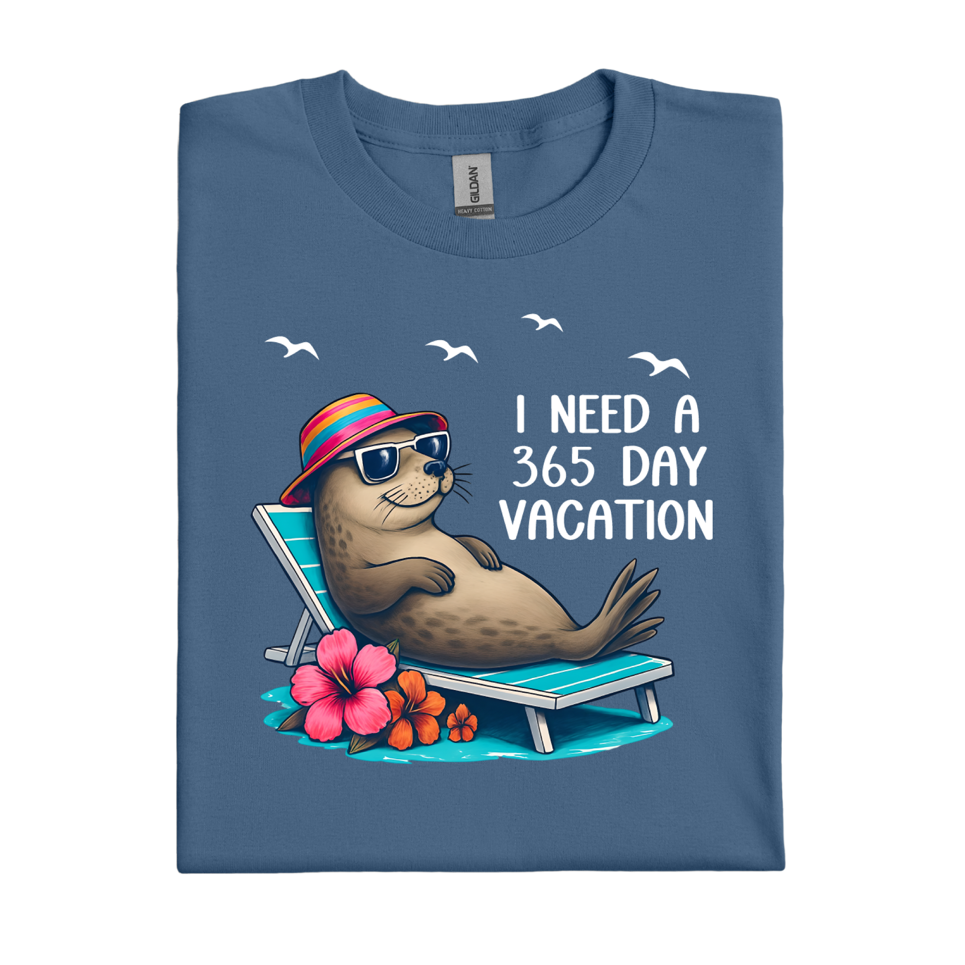 Indigo Blue t-shirt with a seal graphic and text 'I Need a 365 Day Vacation' on a white background