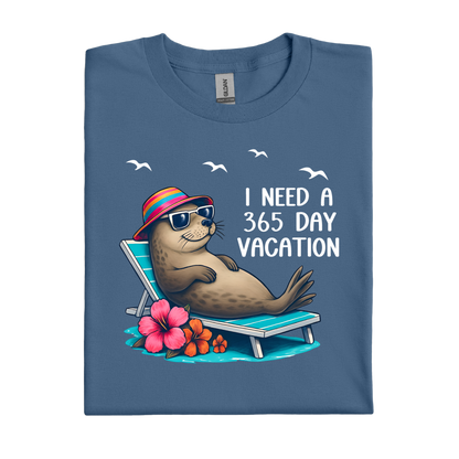 Indigo Blue t-shirt with a seal graphic and text 'I Need a 365 Day Vacation' on a white background