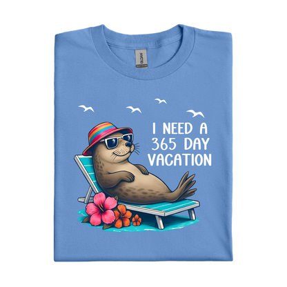 Folded Carolina blue t-shirt with a seal graphic and text on a white background