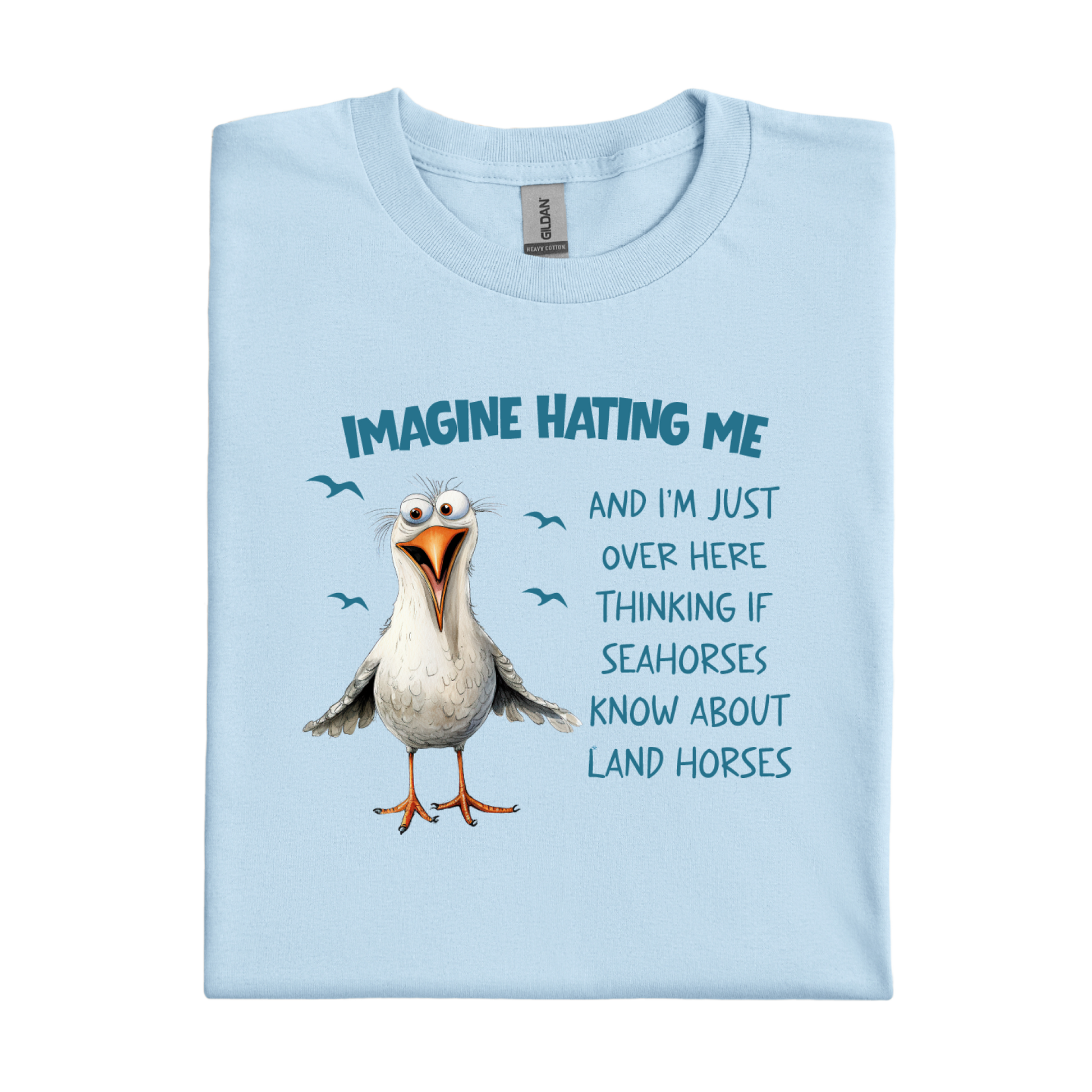 Light blue t-shirt with a cartoon seagull and humorous text on a white background