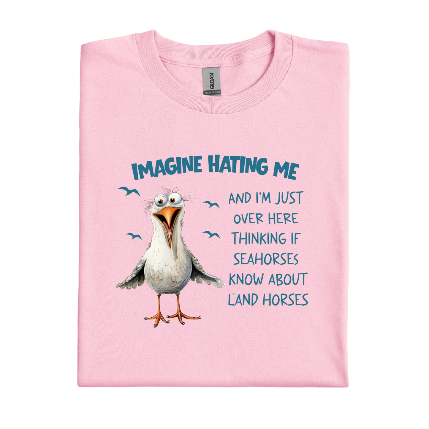 Light Pink t-shirt with a cartoon seagull and humorous text on a white background