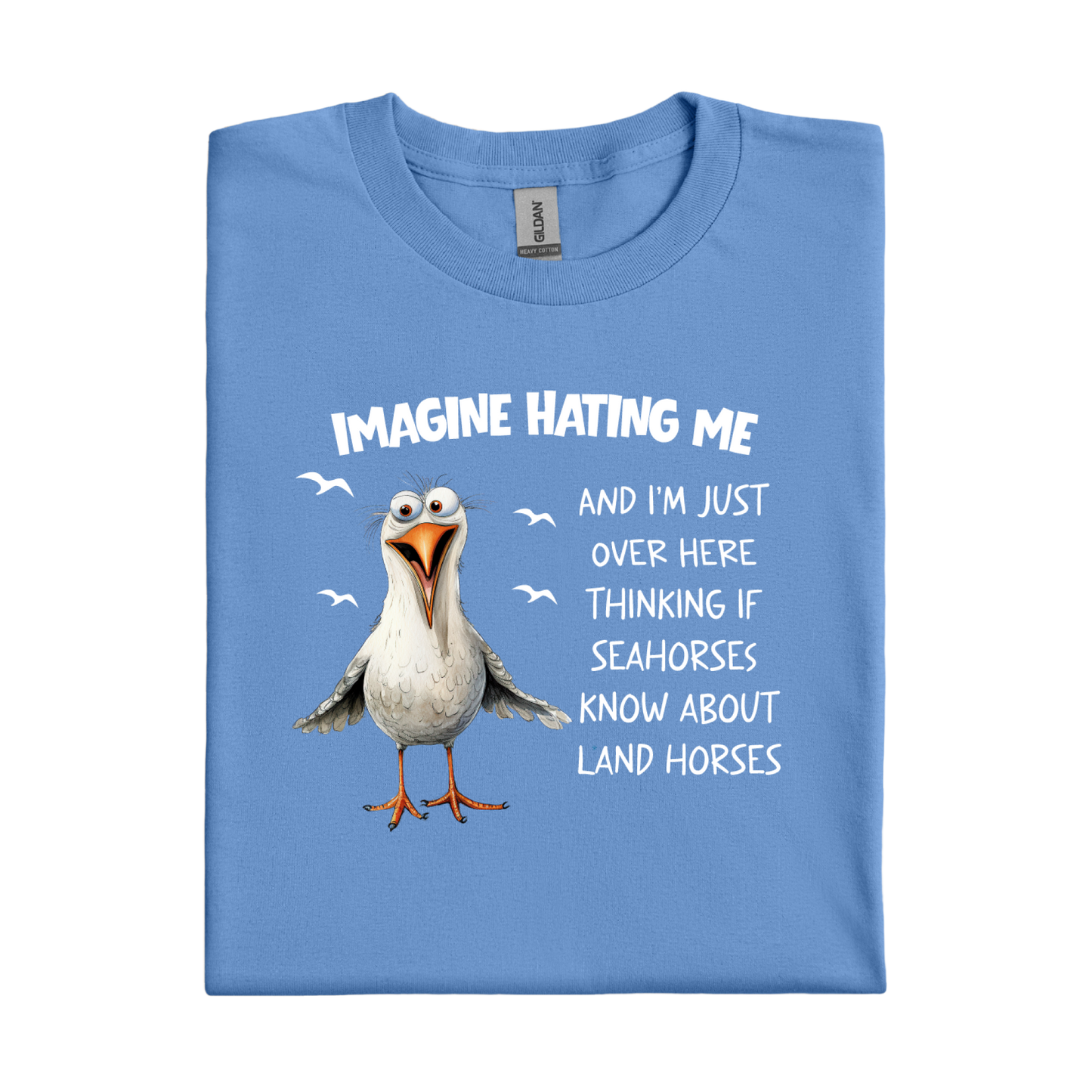 Carolina Blue t-shirt with a cartoon seagull and humorous text on a white background
