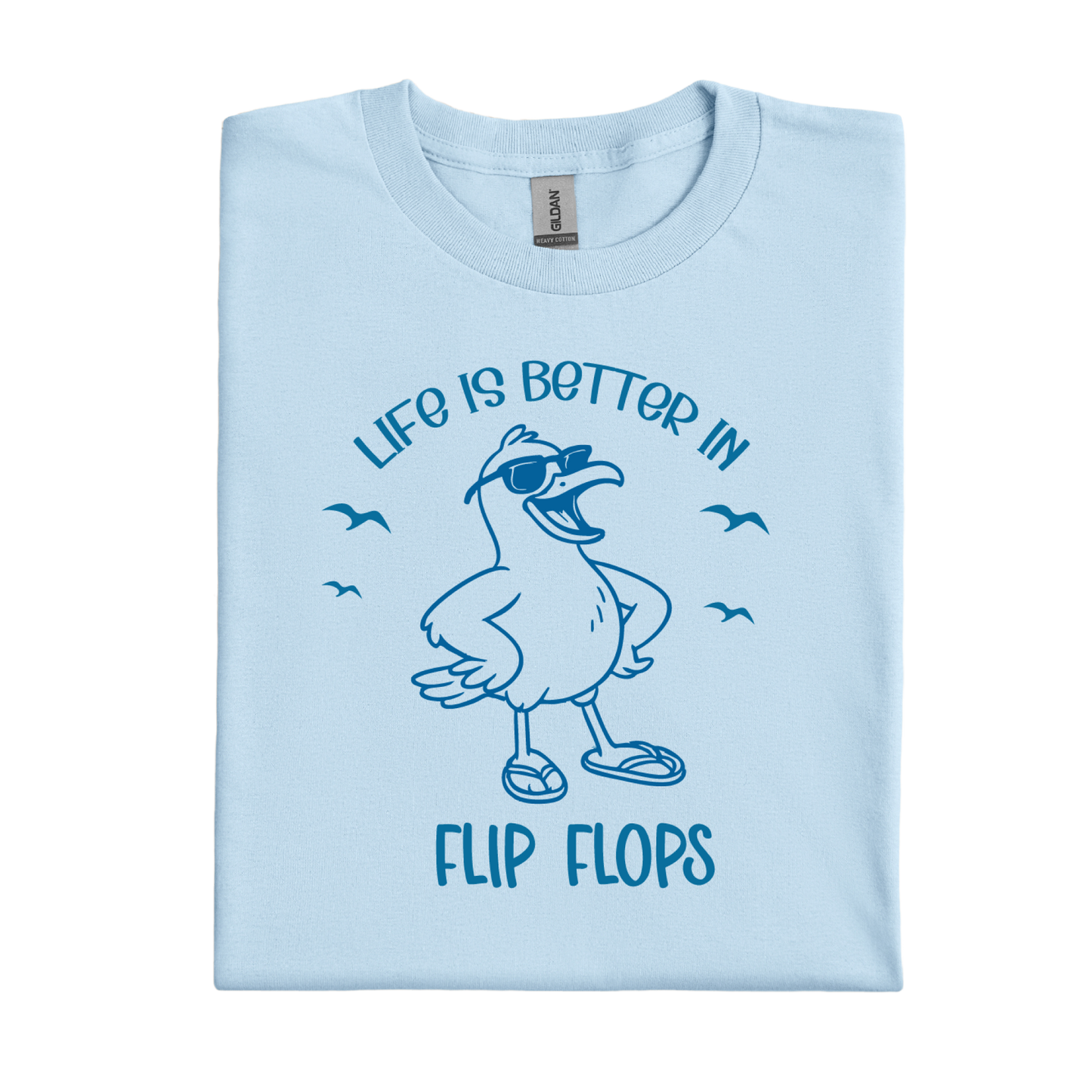 Light blue t-shirt with a cartoon seagull and text 'Life is better in flip flops' on a white background