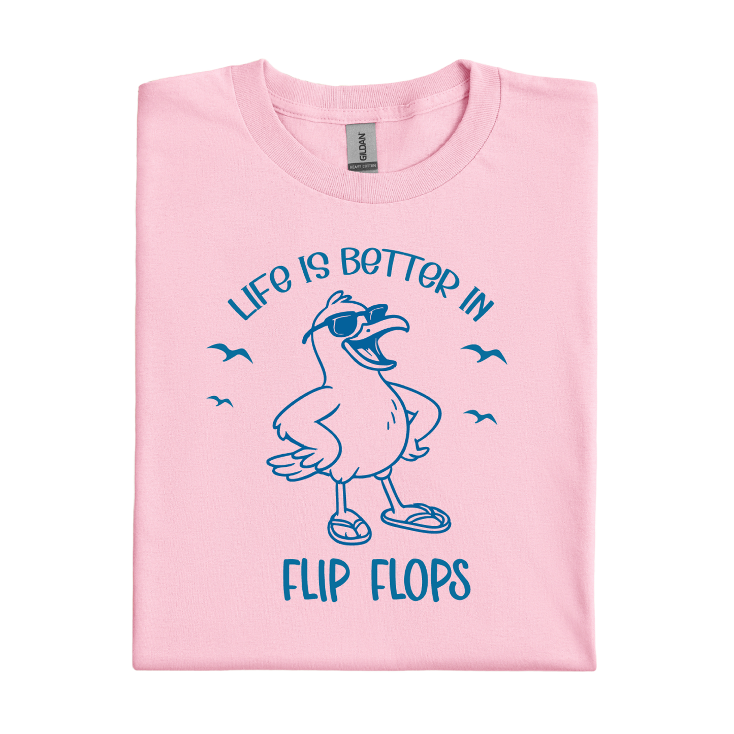 Light Pink t-shirt with blue seagull graphic and text 'Life is better in flip flops' on a white background