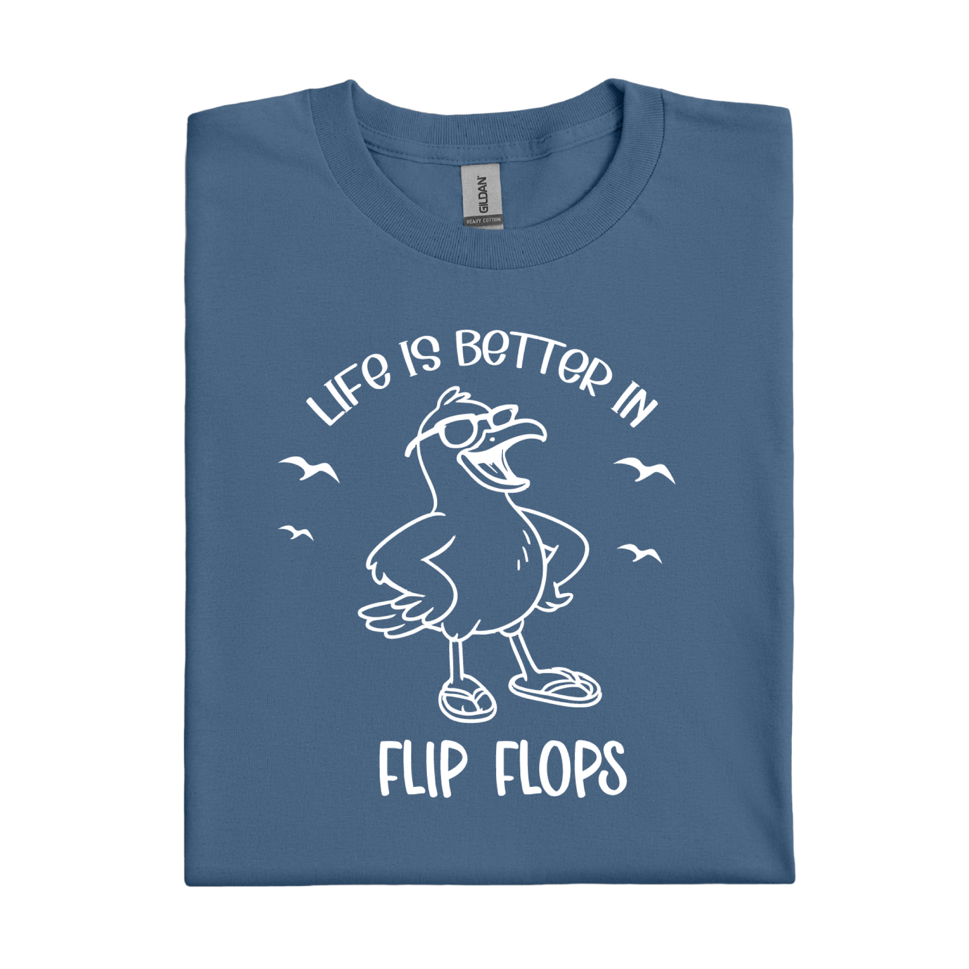 Folded indigo blue t-shirt with a seagull graphic and text on a white background