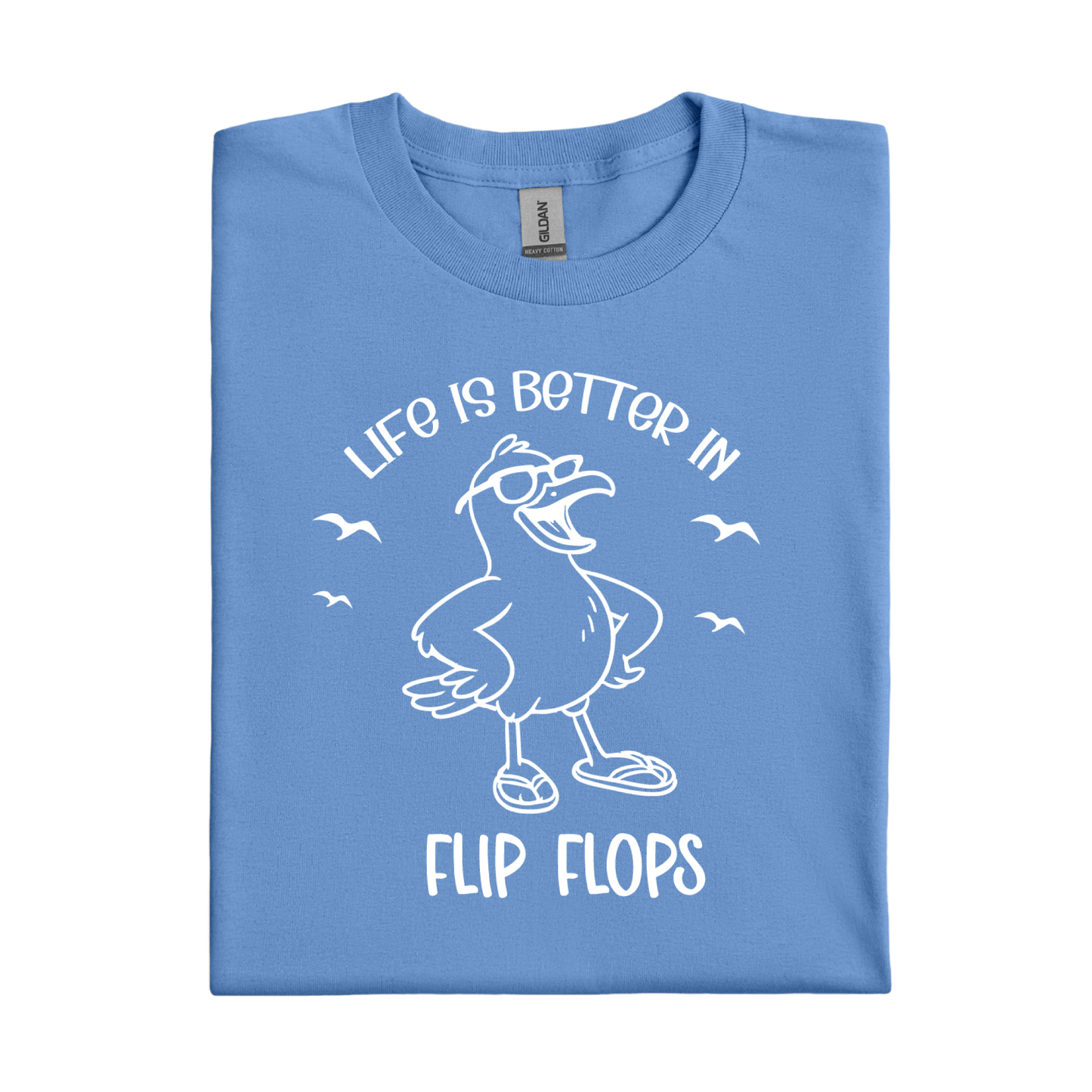 Carolina Blue t-shirt with a cartoon seagull and text 'Life is better in flip flops' on a white background