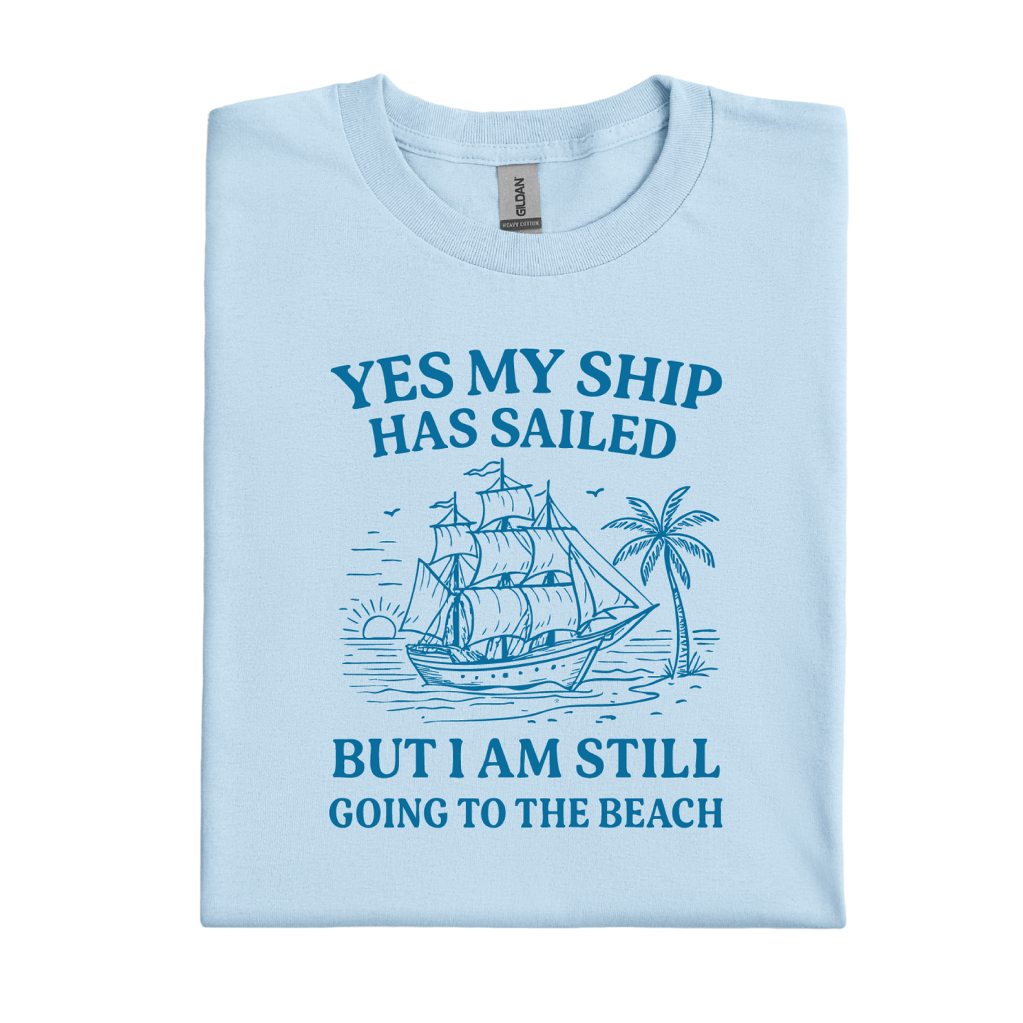 Light blue t-shirt with a ship and beach graphic and text on a white background