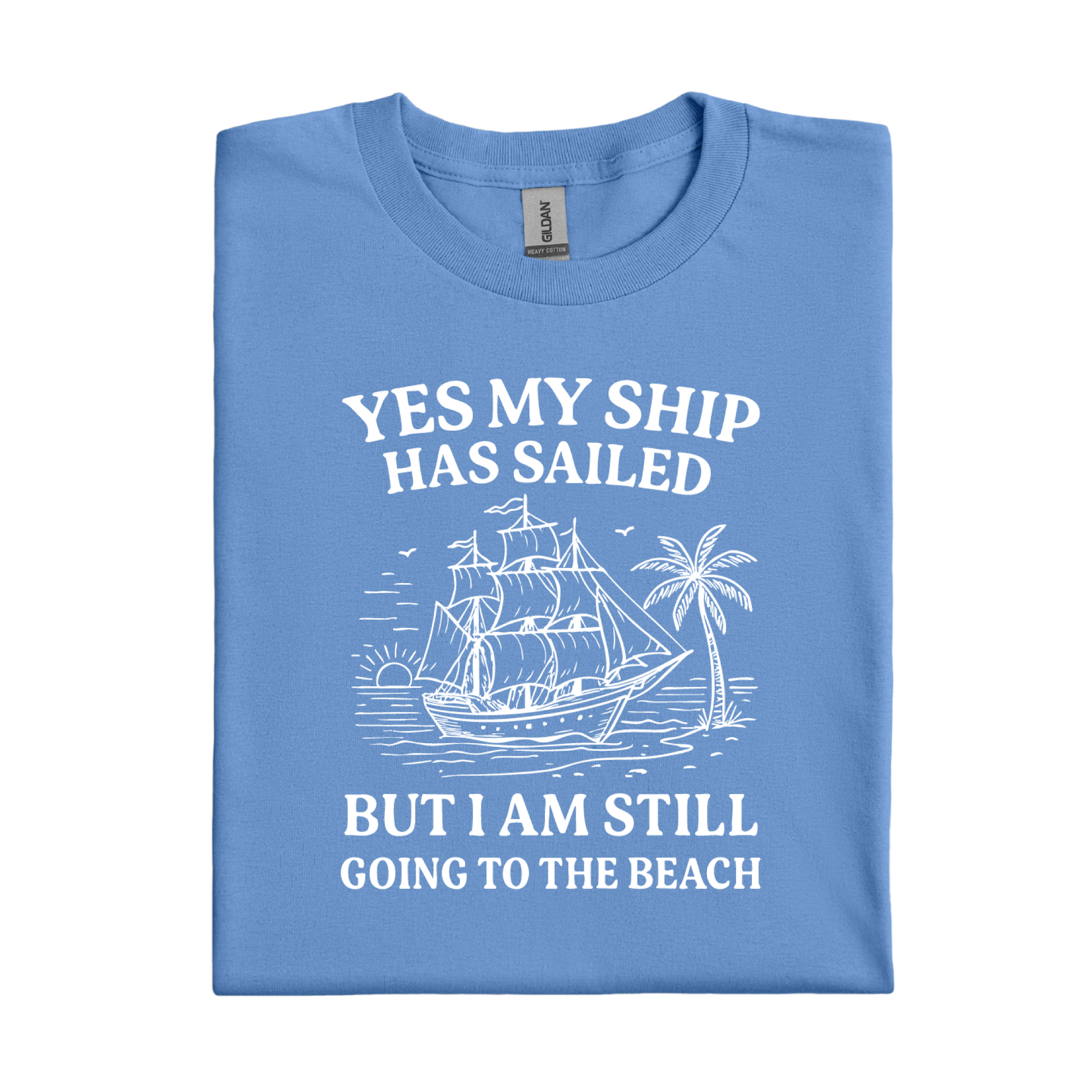 Carolina Blue t-shirt with white graphic and text 'YES MY SHIP HAS SAILED BUT I AM STILL GOING TO THE BEACH' on a white background