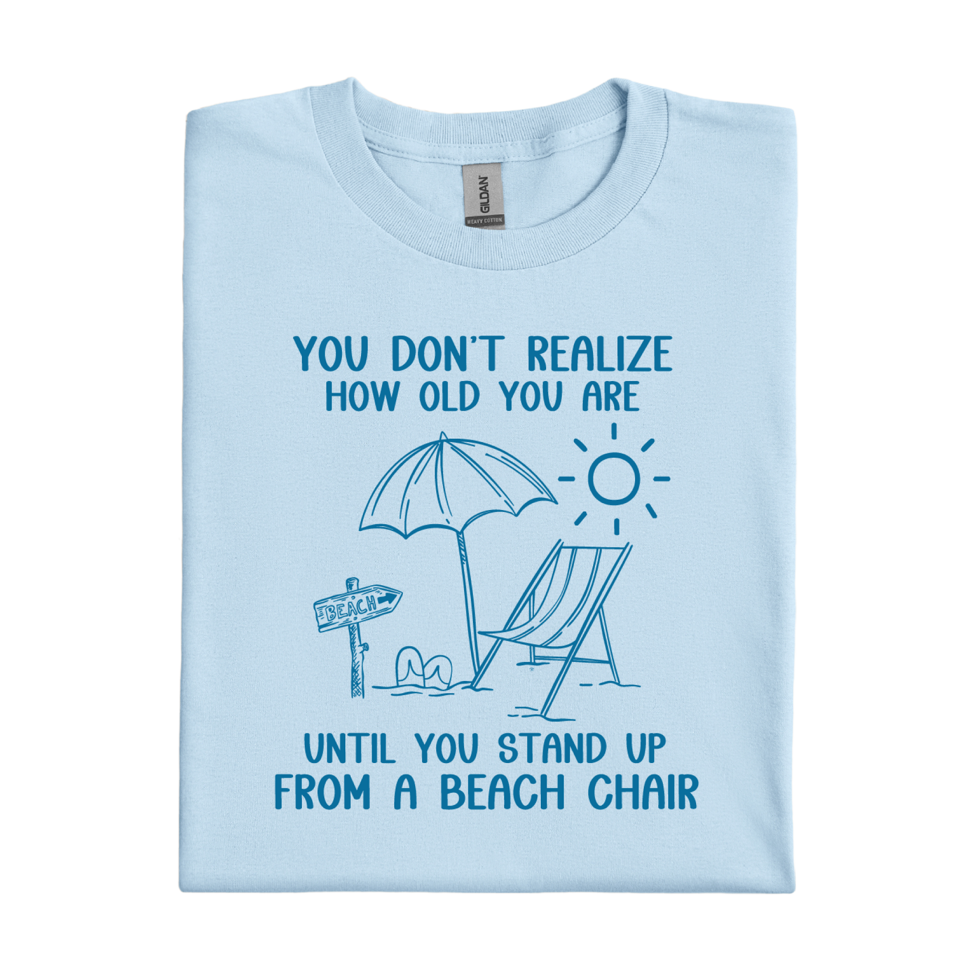 Light blue t-shirt with beach-themed design and text on a white background