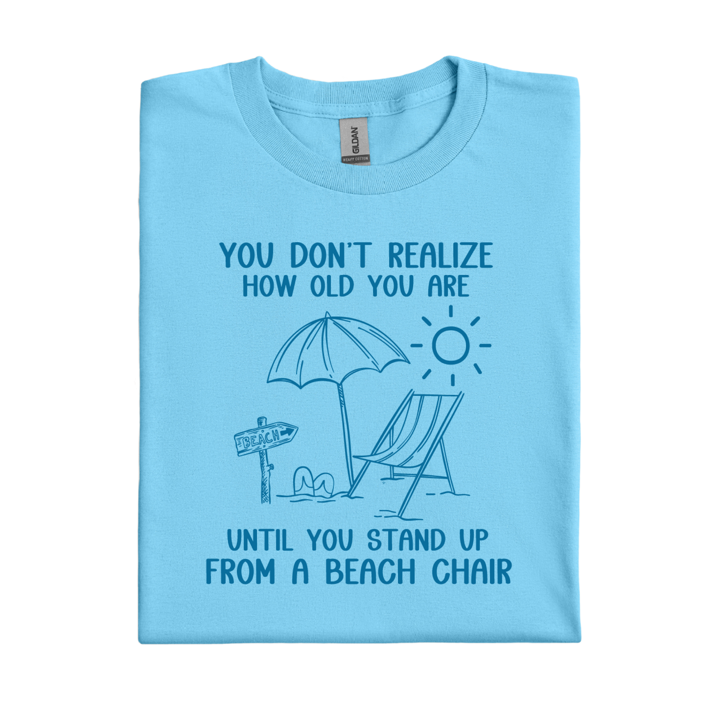 Sky blue t-shirt with beach graphic and text on a white background