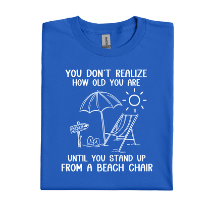 Royal Blue t-shirt with beach graphic and humorous text on a white background