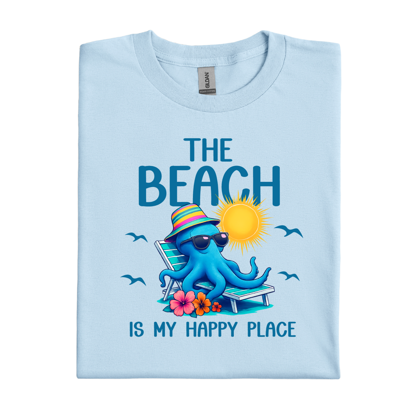 Light blue t-shirt with a cartoon octopus and beach-themed text on a white background