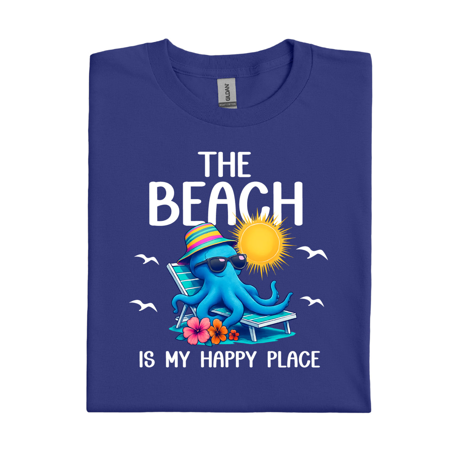 Folded cobalt blue t-shirt with an octopus graphic and beach-themed text on a white background