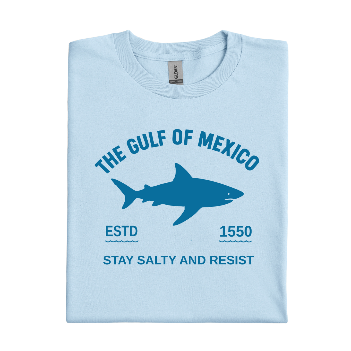 Light blue t-shirt with shark graphic and text on a white background