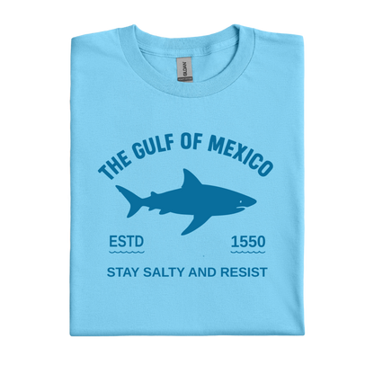 Sky blue t-shirt with shark graphic and text on a white background
