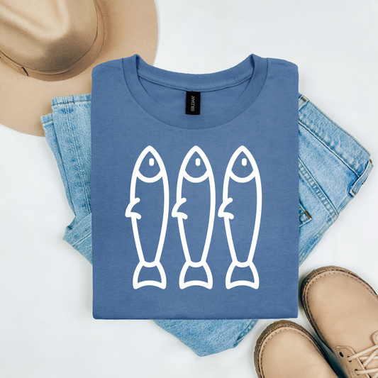 Gildan 5000 "Fisherman's Aesthetic t shirt with three sardine graphics in monochrome color. Picture on a flay lay mockup with pair of blue jeans, brown shoes and a hat accessory.