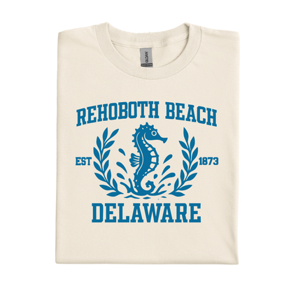 Natural t-shirt with blue 'Rehoboth Beach, Delaware' design featuring a seahorse.