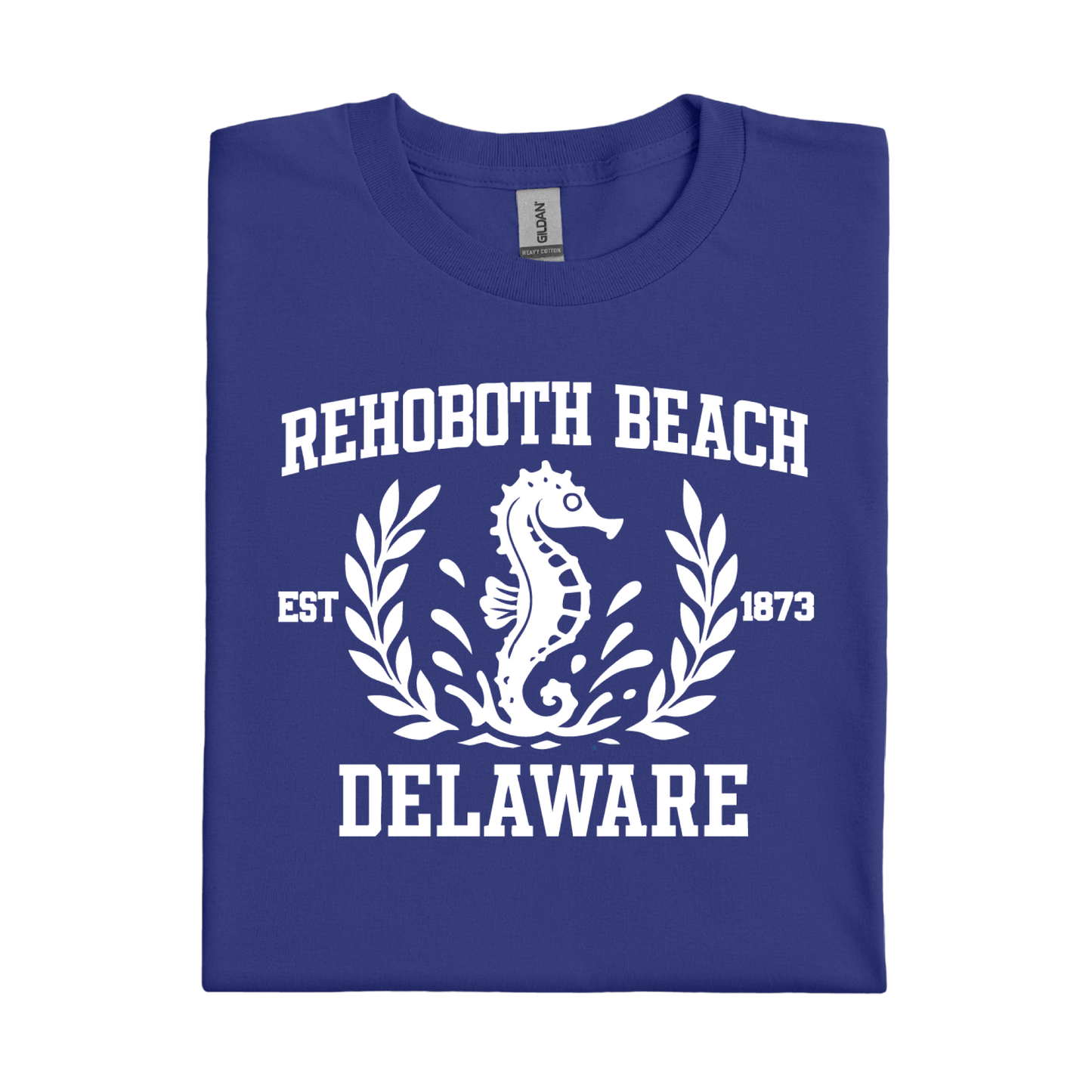 Folded cobalt blue t-shirt with white 'Rehoboth Beach, Delaware' design featuring a seahorse.