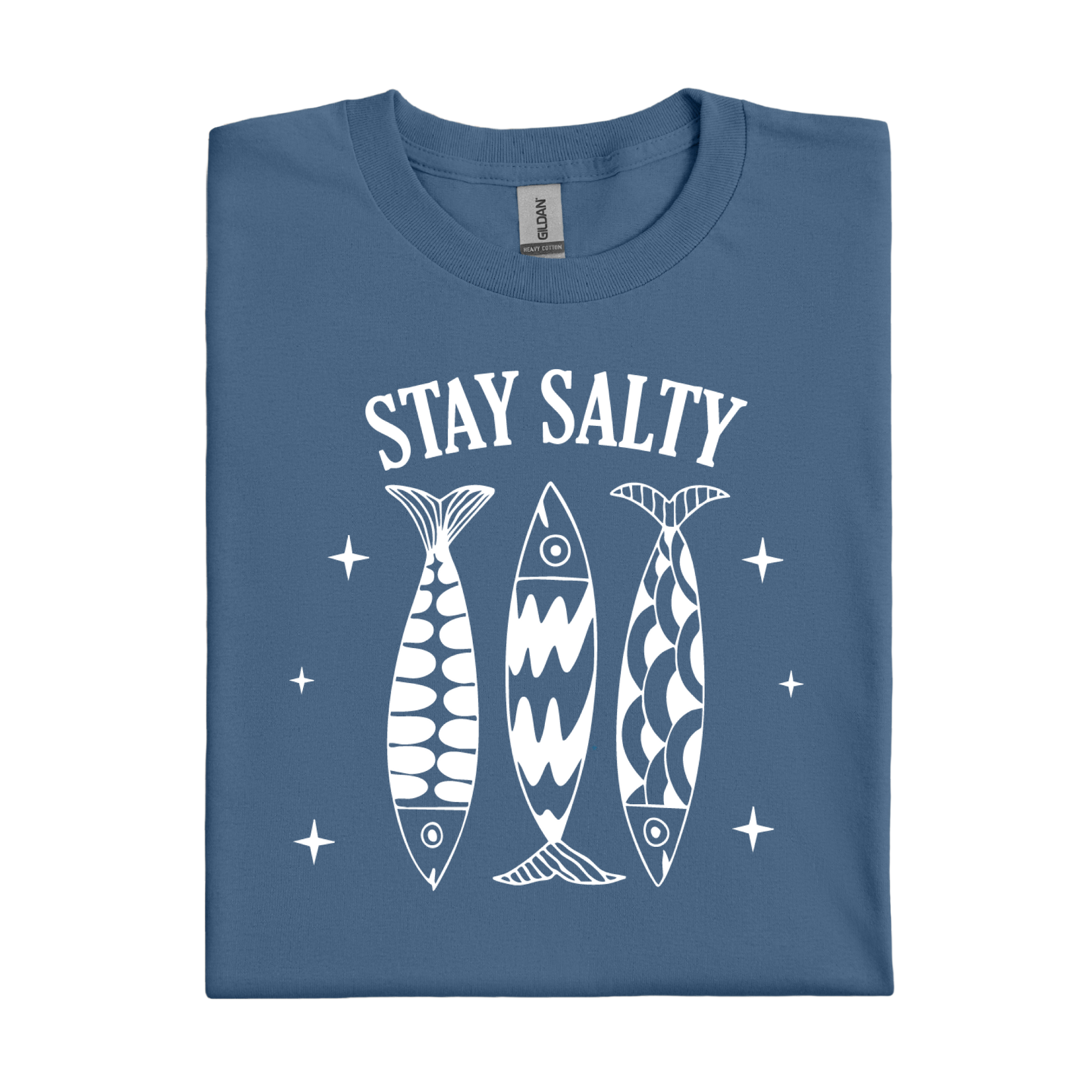 Folded indigo blue t-shirt with 'Stay Salty' text and fish graphics on a white background