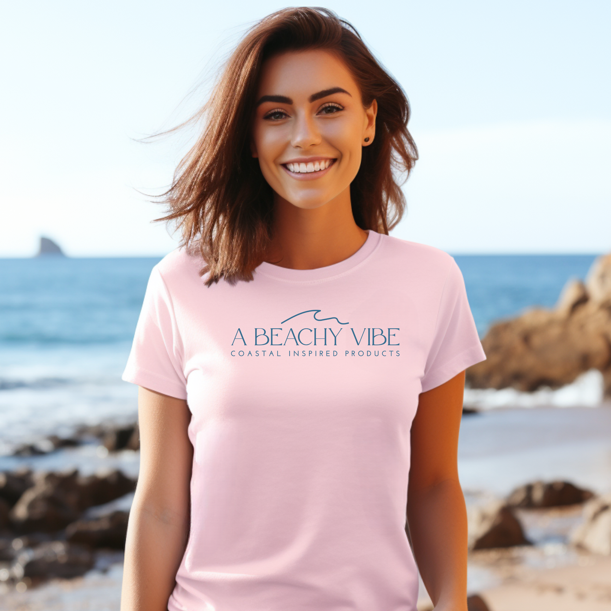 Gildan 5000 "A Beachy Vibe" t shirt with a simple wave graphic in one color. Picture of a girl standing on the beach  wearing a t shirt.