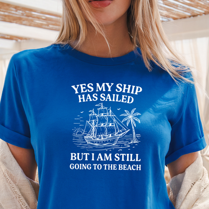 Person wearing a Royal blue t-shirt with a ship graphic and text.