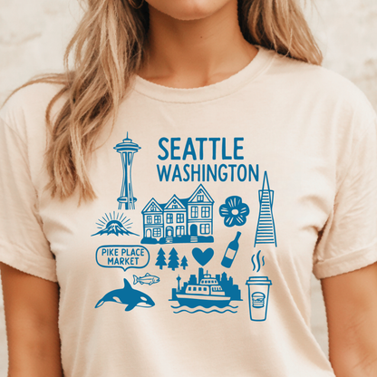 Person wearing a t-shirt with Seattle-themed graphics and text.