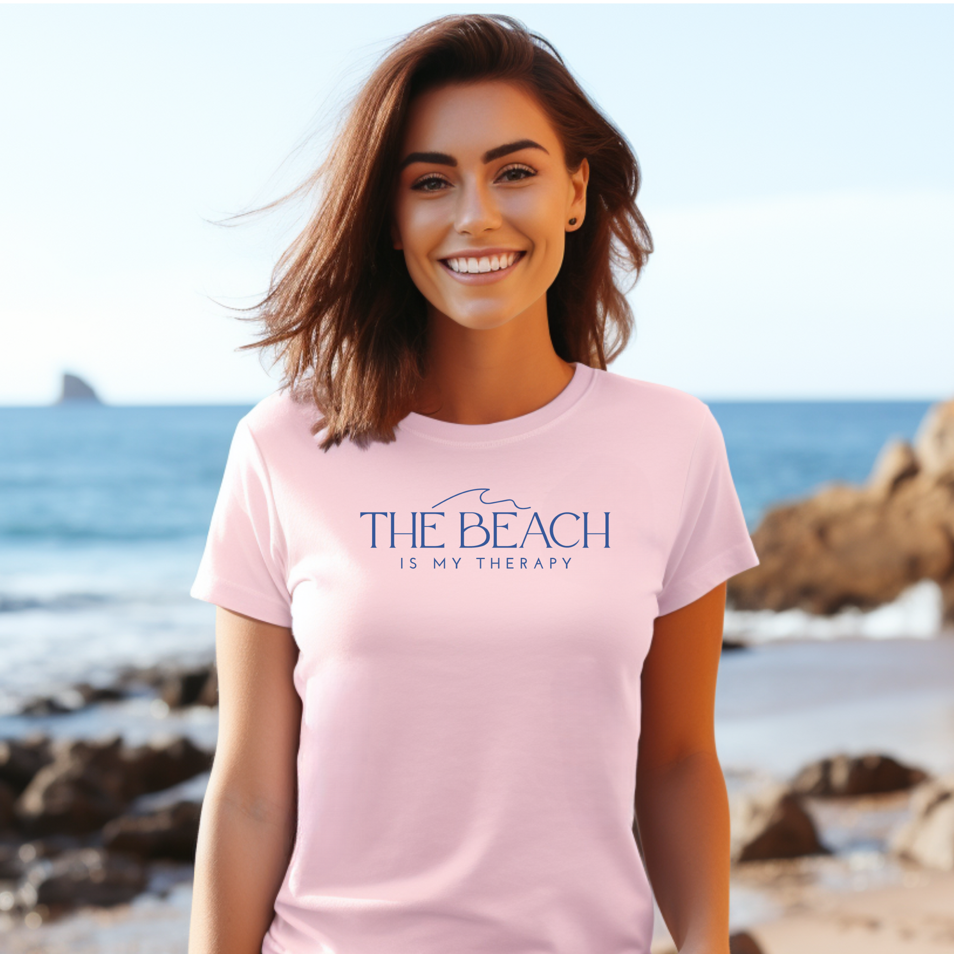 Gildan 5000 "The Beach Is My Therapy" t shirt with a simple wave graphic in one color. Picture of a girl standing on the beach wearing a t shirt.