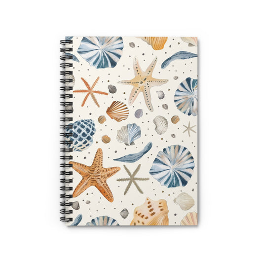 The Coastal Beach Spiral Notebook features a spiral-bound cover with seashell and starfish illustrations in blue, orange, and beige on a white background. It’s perfect for journaling or capturing seaside inspirations.
