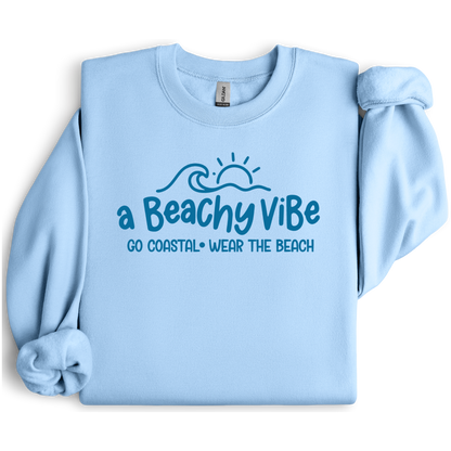 Light blue sweatshirt with 'a Beachy Vibe' text design on a white background