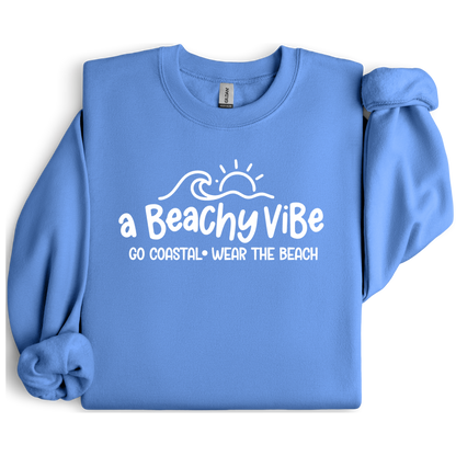 Carolina Blue sweatshirt with 'a Beachy Vibe' text and graphics on a white background