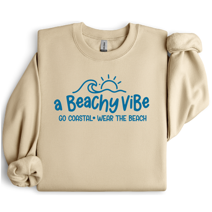 Sand sweatshirt with blue 'A Beachy Vibe' text design on a white background