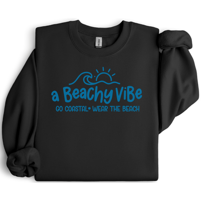 Black sweatshirt with blue 'a Beachy Vibe' text design on a white background