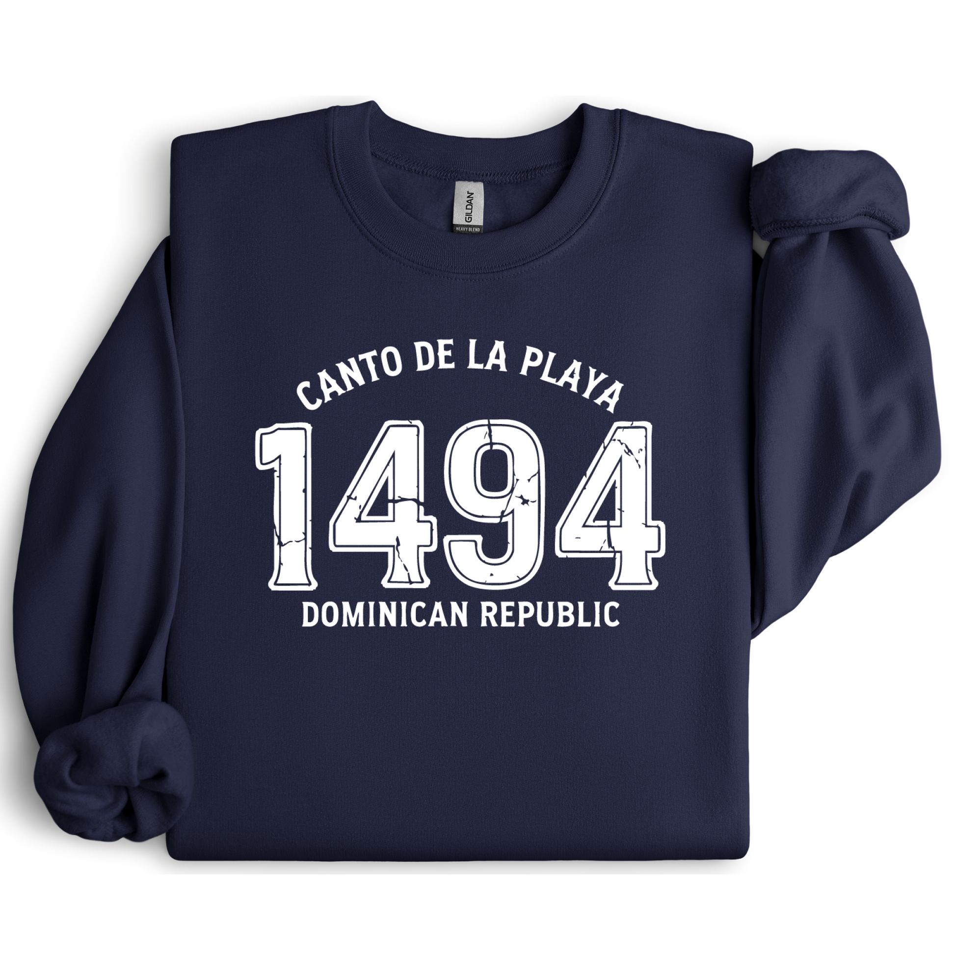 Gildan sweatshirt with “Canto De La Playa 1494 Dominican Republic” printed in distressed navy text. Vintage beach-inspired crewneck symbolizing Caribbean heritage and coastal charm. Made from soft cotton-poly blend fabric for comfort and style, ideal for beach lovers and travelers who adore Dominican culture. Cozy, sustainable, and perfect for casual wear or tropical getaways.