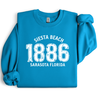 Sapphire Blue sweatshirt with white text 'Siesta Beach 1886 Sarasota Florida' on a white background