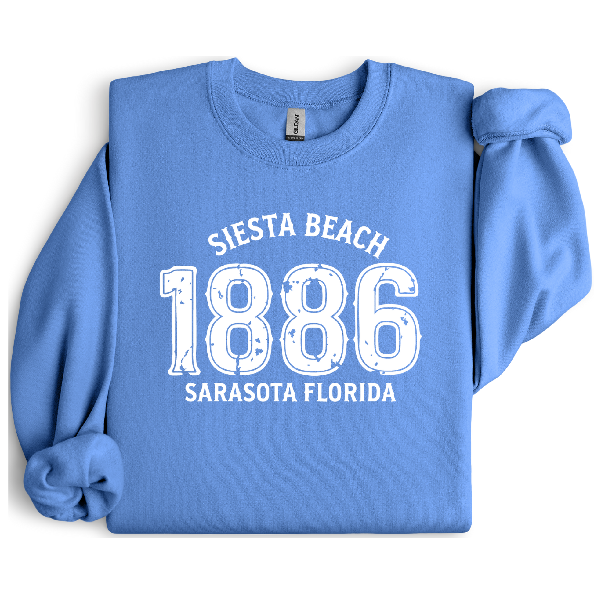 Carolina Blue sweatshirt with white text 'Siesta Beach 1886 Sarasota Florida' on a white background