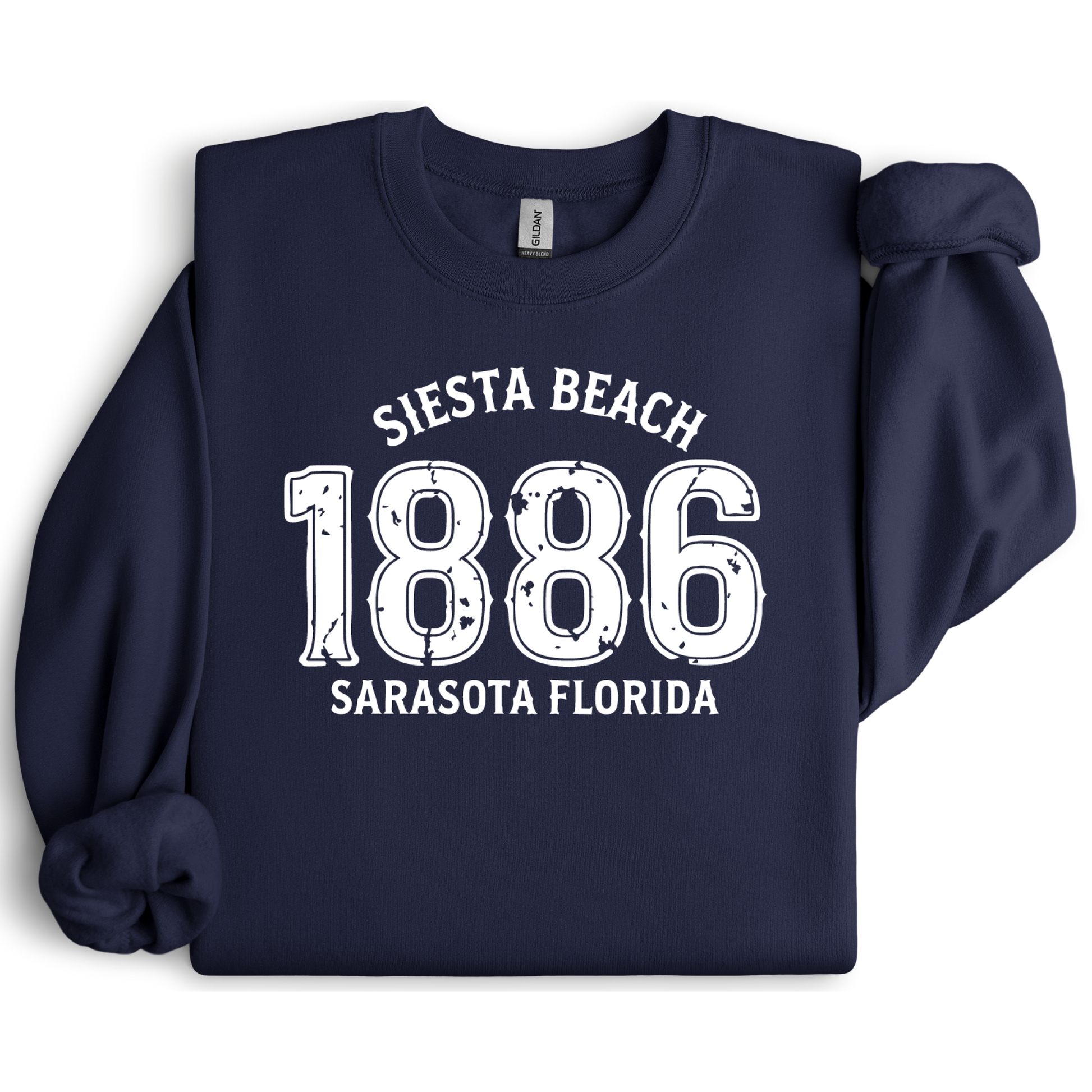 Navy blue sweatshirt with white text 'Siesta Beach 1886 Sarasota Florida' on a white background