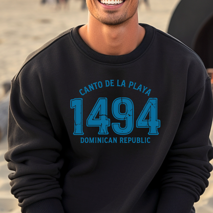 Gildan sweatshirt with “Canto De La Playa 1494 Dominican Republic” printed in distressed navy text. Vintage beach-inspired crewneck symbolizing Caribbean heritage and coastal charm. Made from soft cotton-poly blend fabric for comfort and style, ideal for beach lovers and travelers who adore Dominican culture. Cozy, sustainable, and perfect for casual wear or tropical getaways.