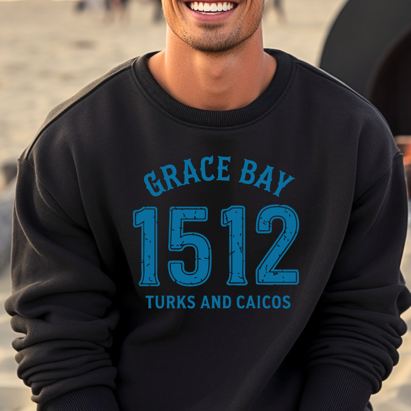 Gildan sweatshirt featuring blue text that reads “Grace Bay 1512 Turks and Caicos” in a vintage collegiate style. Cozy cotton-poly blend pullover with ribbed cuffs and waistband for a relaxed, durable fit. Ideal for beach lovers, island travelers, and fans of coastal fashion. Perfect for staying cozy while showcasing love for one of the Caribbean’s most beautiful beaches — Grace Bay.